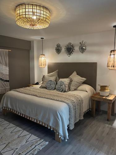 Ένα ή περισσότερα κρεβάτια σε δωμάτιο στο Zen Suites by Regente