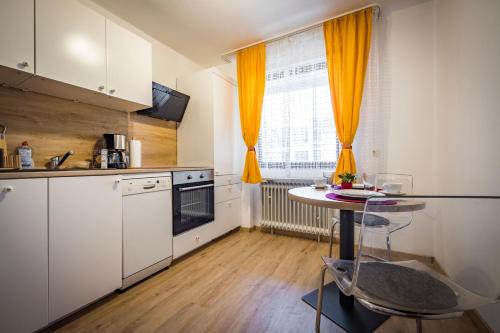 Кухня или кухненски бокс в Ferienwohnung Sophia