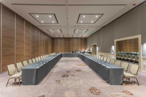a large conference room with a long table and chairs at Presidente InterContinental Mexico City by IHG in Mexico City