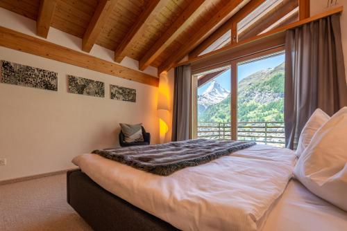 Postel nebo postele na pokoji v ubytování Modern apartment with view over Zermatt