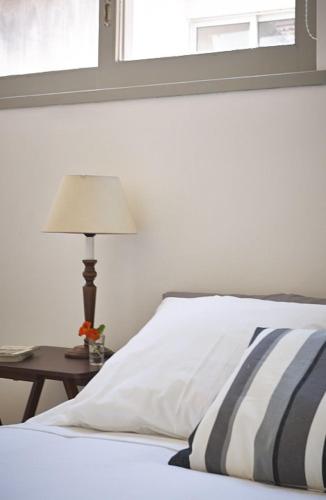 Ένα ή περισσότερα κρεβάτια σε δωμάτιο στο Casas do Arco
