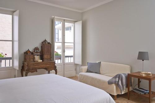 Ένα ή περισσότερα κρεβάτια σε δωμάτιο στο Casas do Arco