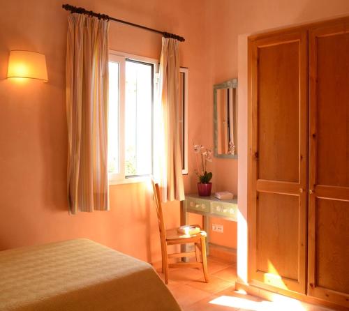 Ένα ή περισσότερα κρεβάτια σε δωμάτιο στο Villas Las Golondrinas