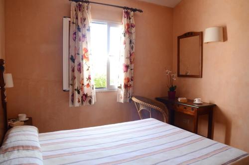 En eller flere senger på et rom på Villas Las Golondrinas