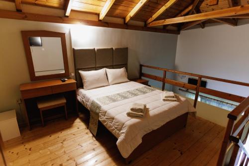 Ένα ή περισσότερα κρεβάτια σε δωμάτιο στο Alea Villas