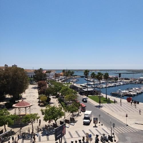 an aerial view of a marina with boats in the water at Guesthouse Milagre Centro Faro in Faro