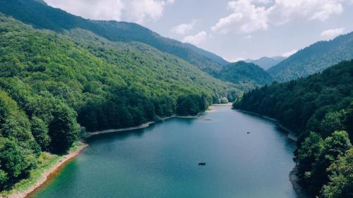 an aerial view of a river in a valley at Modern Mountain - Apartment Najomi in Kolašin
