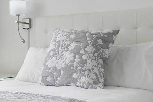 Ένα ή περισσότερα κρεβάτια σε δωμάτιο στο Horizon Bay 1106 Beachfront Self-catering APT by HMH