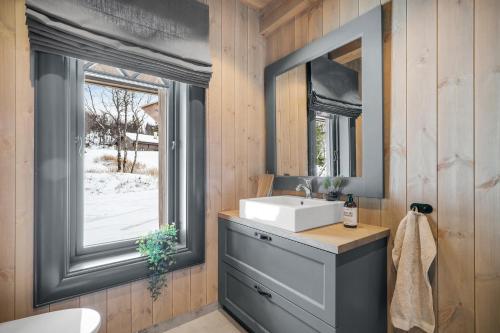 Bilik mandi di NEW LUXUARY Cabin with perfect location on Geilo.