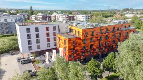 an overhead view of a building in a city at havenhostel Stade - Hotel in Stade