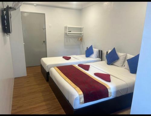 Postel nebo postele na pokoji v ubytování ESM Hotel