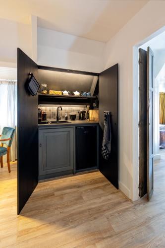 Η κουζίνα ή μικρή κουζίνα στο Bed & Breakfast - Gallery 't Speelhuys