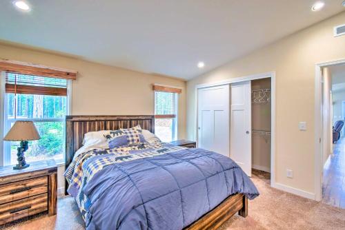 a bedroom with a bed and a window at Awesome Hoodsport Cabin - Nearby Hiking Areas in Hoodsport