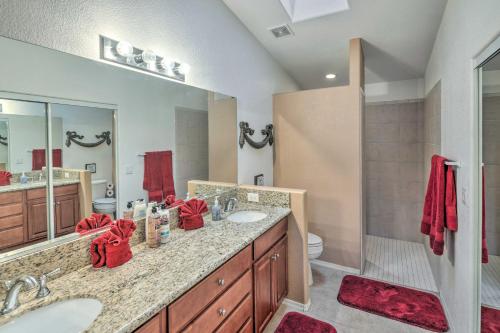 a bathroom with two sinks and a large mirror at Arizona Retreat with Casita about 2 Mi to Lake Havasu in Lake Havasu City