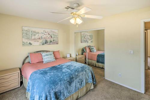 a bedroom with two beds and a ceiling fan at Arizona Retreat with Casita about 2 Mi to Lake Havasu in Lake Havasu City