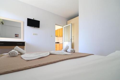 Postel nebo postele na pokoji v ubytování Neranxi Apartament