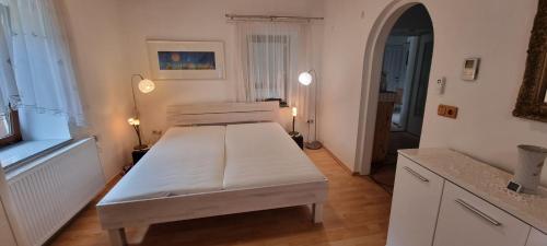 Posteľ alebo postele v izbe v ubytovaní Innenstadtgarten-Wohnung