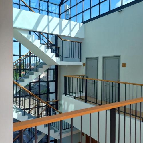 a view of a staircase in a building at Alleyhill Phuket - Private & Cozy Boutique in Phuket Town