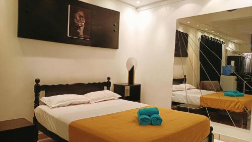 Katil atau katil-katil dalam bilik di SW Home MU **** Mont Choisy