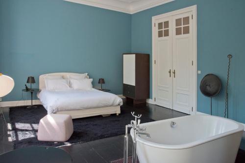 Ένα ή περισσότερα κρεβάτια σε δωμάτιο στο Appartement Chic
