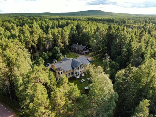 an aerial view of a large house in the woods at Turistgården Särna in Särna