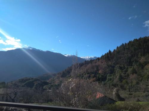 a view of a mountain from a road at Το σπιτάκι του Σπύρου in Oinokhórion