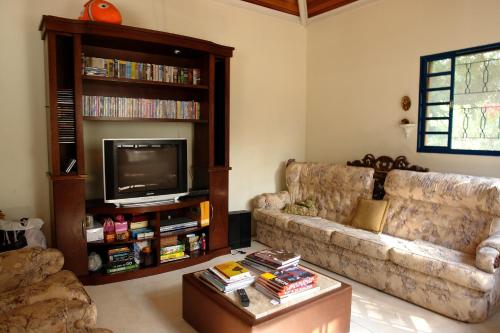 A seating area at Ecopousada João Y Maria