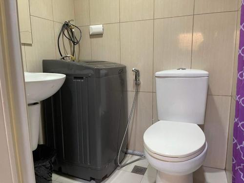 Koupelna v ubytování MOA staycation Shell Residences Pasay city darpm