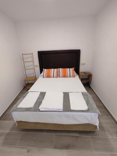 Casa do Vale - Casa Termal - Gerês/Xures tesisinde bir odada yatak veya yataklar