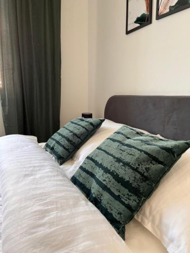 Кровать или кровати в номере Apartament Wiślana