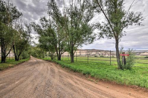a dirt road with trees on the side of a field at Charming Barn Apt in Boulder! Gateway to Parks! in Boulder Town