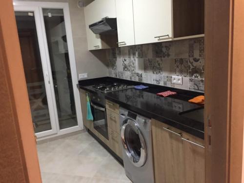 Kuchyň nebo kuchyňský kout v ubytování Résidence Haute Standing Corniche