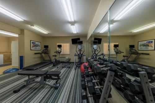 a fitness room with treadmills and exercise machines at Candlewood Suites Springfield-Medical District by IHG in Springfield