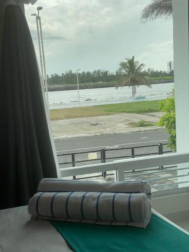 a balcony with a view of the ocean and a beach at NUEVO Depto vista al mar. in Boca del Río