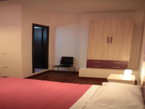 Una cama o camas en una habitación de B&B Cosenza