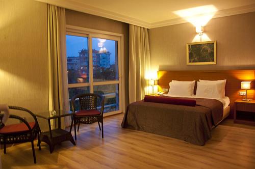 Postel nebo postele na pokoji v ubytování Island Hotel
