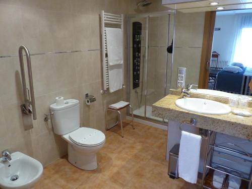 Ванна кімната в Hotel Les Truites Adults only