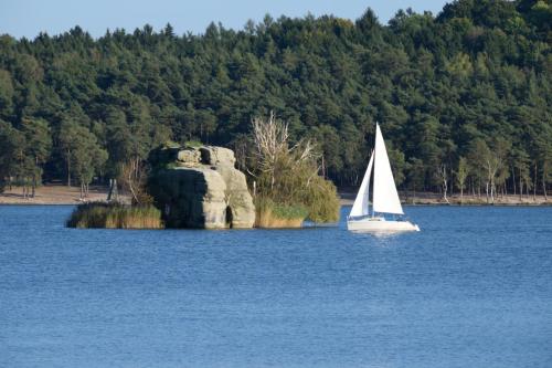 a sailboat in the middle of a large body of water at Vila Terezie in Staré Splavy