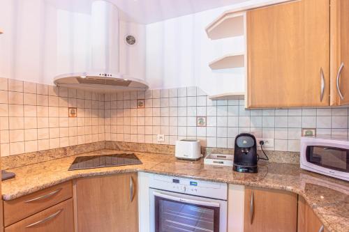 Kuchyň nebo kuchyňský kout v ubytování Superbe appartement avec terrasse et vue dégagée
