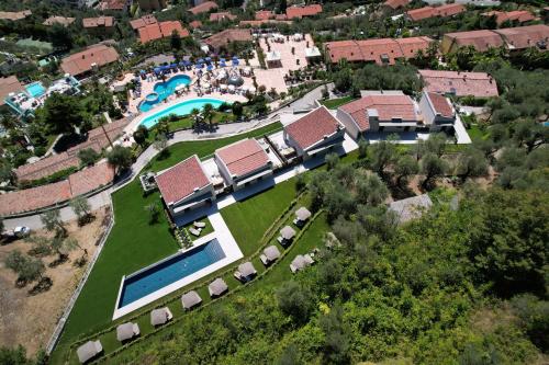 an aerial view of a resort with a swimming pool at LLAC Living Nature Hotel in Limone sul Garda