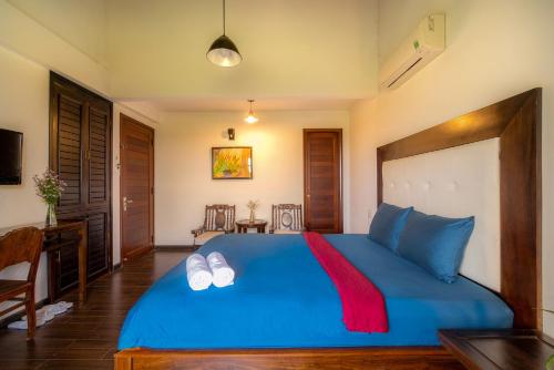 Postel nebo postele na pokoji v ubytování Calm House Hotel Hoi An 1