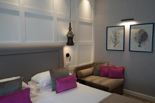 Ένα ή περισσότερα κρεβάτια σε δωμάτιο στο Hotel Lungomare
