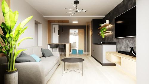 a living room with a white couch and a table at FLH - The Nest in Şelimbăr