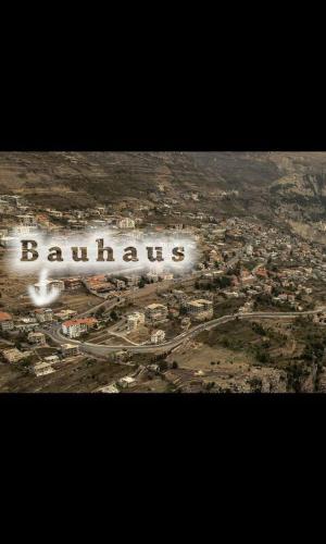 an aerial view of a city with the word bahamas at Bauhaus Motel in Bcharré