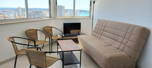 Χώρος καθιστικού στο Vue Ocean