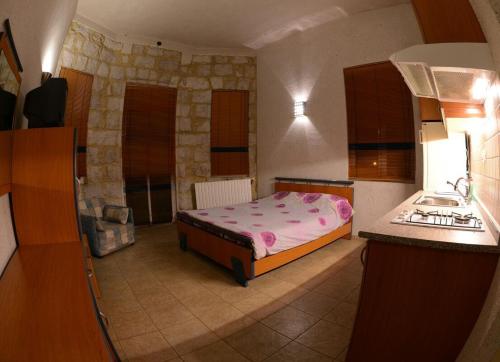 Postel nebo postele na pokoji v ubytování Bauhaus Chalets Apartment
