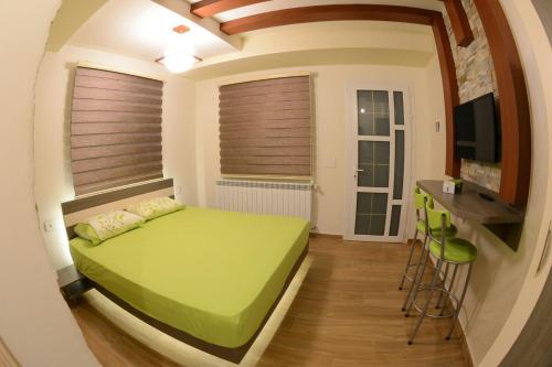 Postel nebo postele na pokoji v ubytování Bauhaus Chalets Apartment