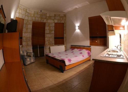 Kuchyň nebo kuchyňský kout v ubytování Bauhaus Chalets Apartment