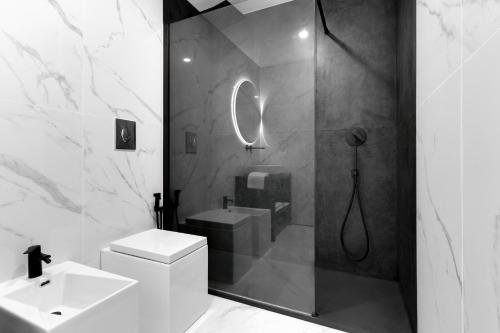 A bathroom at Caralis Suites Rooms