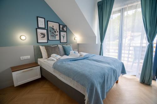 Posteľ alebo postele v izbe v ubytovaní Apart Invest Centrum Park 26